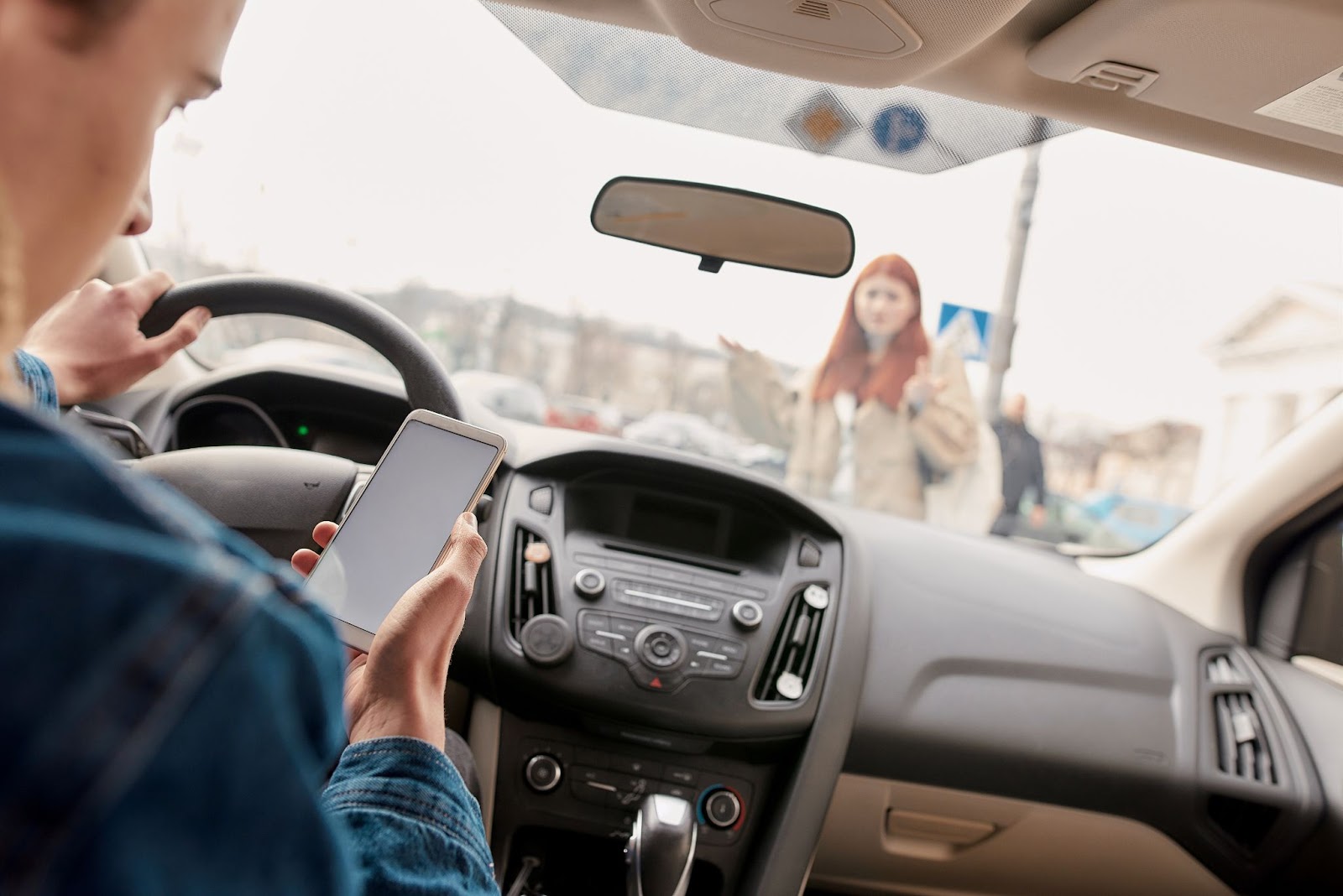 I was Hit By a Car in NC While Walking. How Do I File a Claim? 1 Distracted Driving