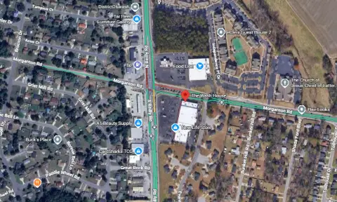 Vehicle Slams Into Fayetteville Laundromat on South Reilly Road, Police Investigate