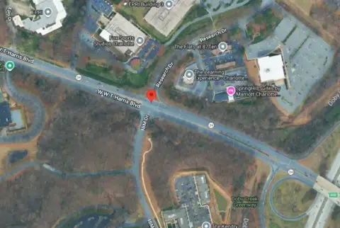 Charlotte School Bus and Car Crash on W.T. Harris Blvd Near Research Dr Leaves One Injured